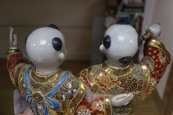 A Satsuma pottery group of two boys drumming, height 28cm